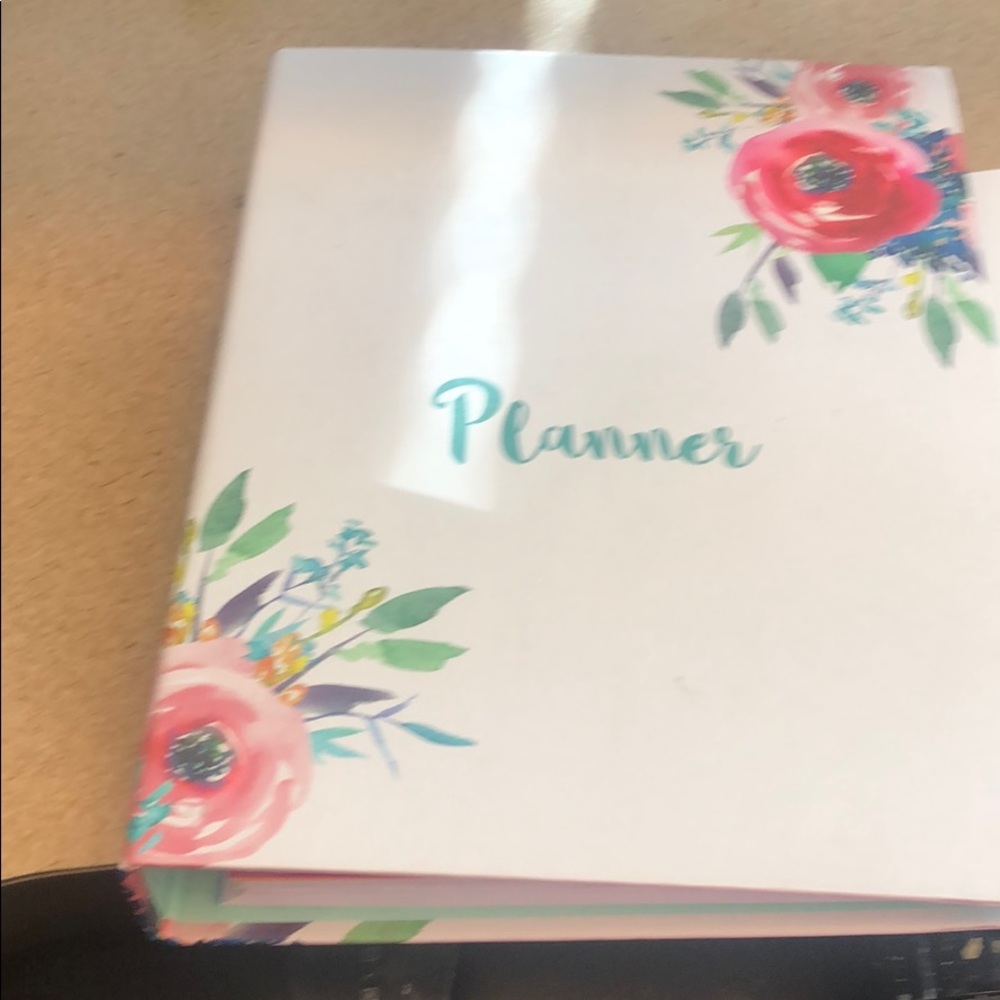 Planner with green rubber closure